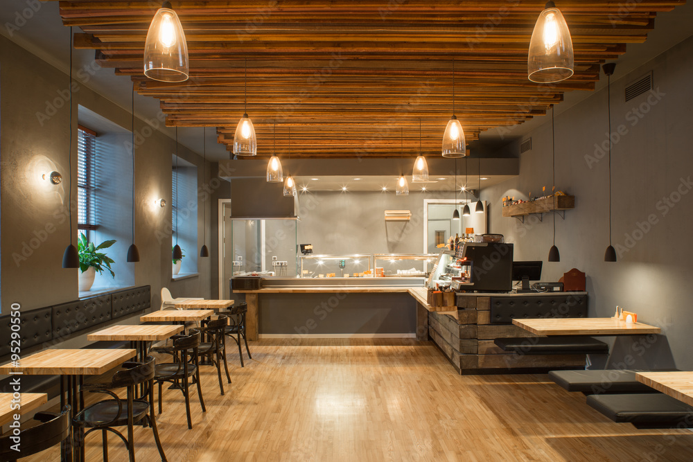 Interior of restaurant. Wooden design.