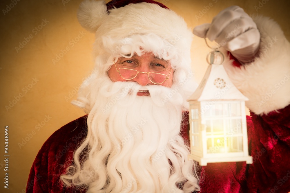 Santa Claus holding magic lantern