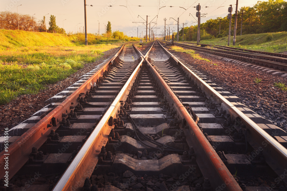 Cargo train platform at sunset. Railroad. Railway station