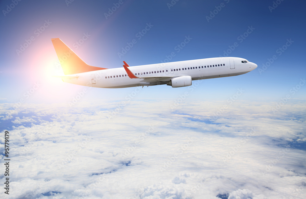 Plane flying over the clouds