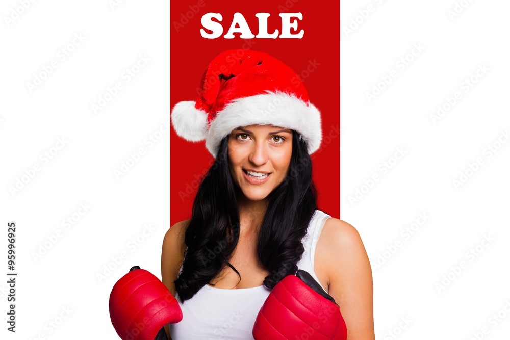 Composite image of woman wearing red boxing gloves