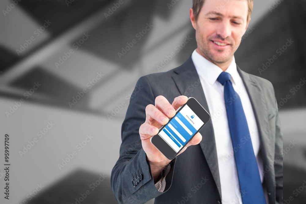 Composite image of businessman showing his smartphone screen