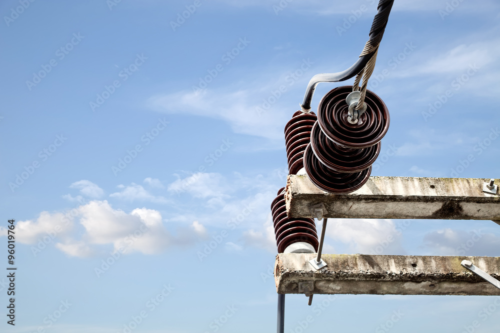 Electricity line and cup on blue sky  background with clipping p