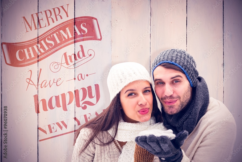 Composite image of young winter couple