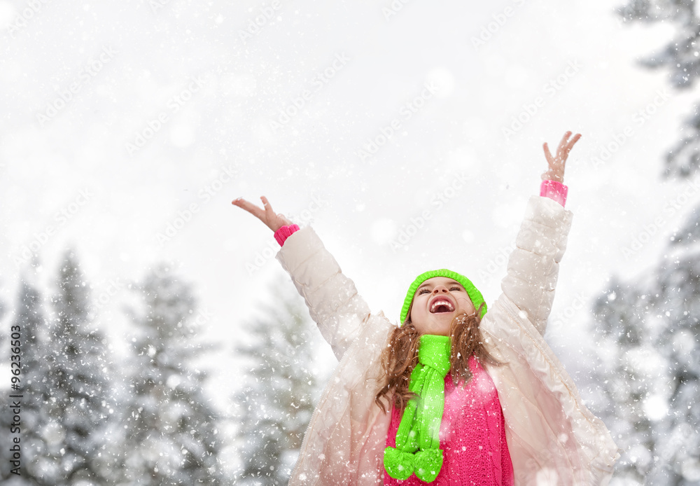 girl playing on a winter walk