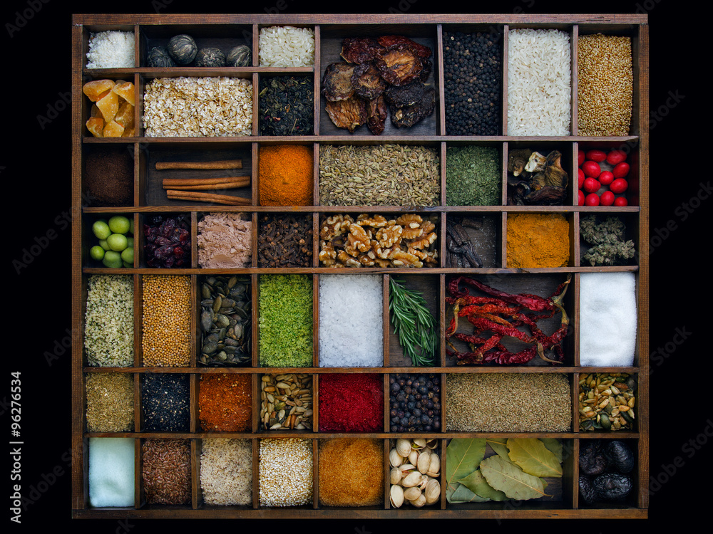 Various spices and seed in wooden box