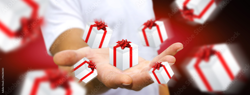 Man celebrating christmas holding gift in his hand