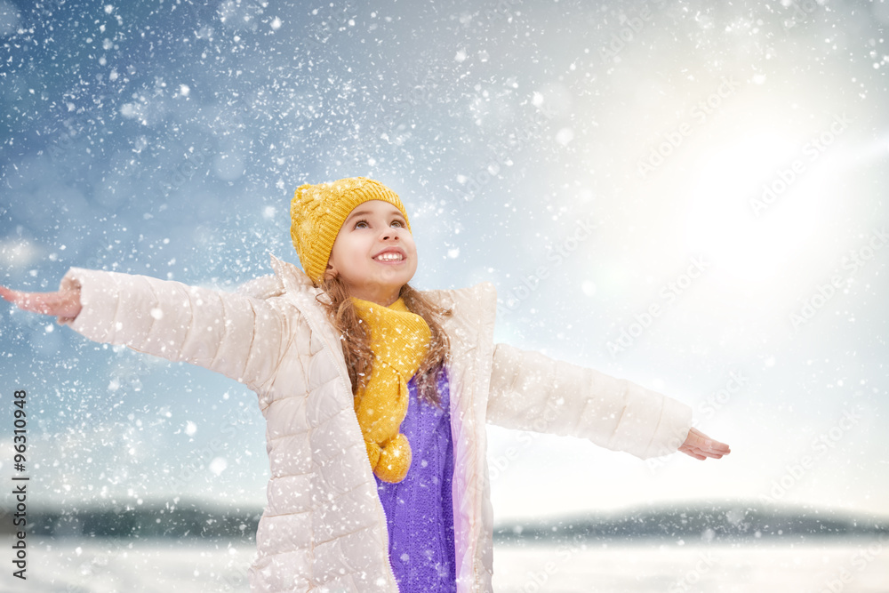 girl playing on a winter walk