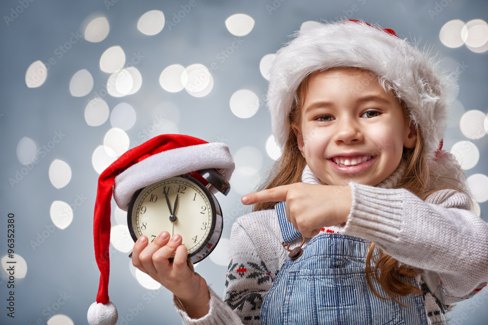 child in a Christmas hat