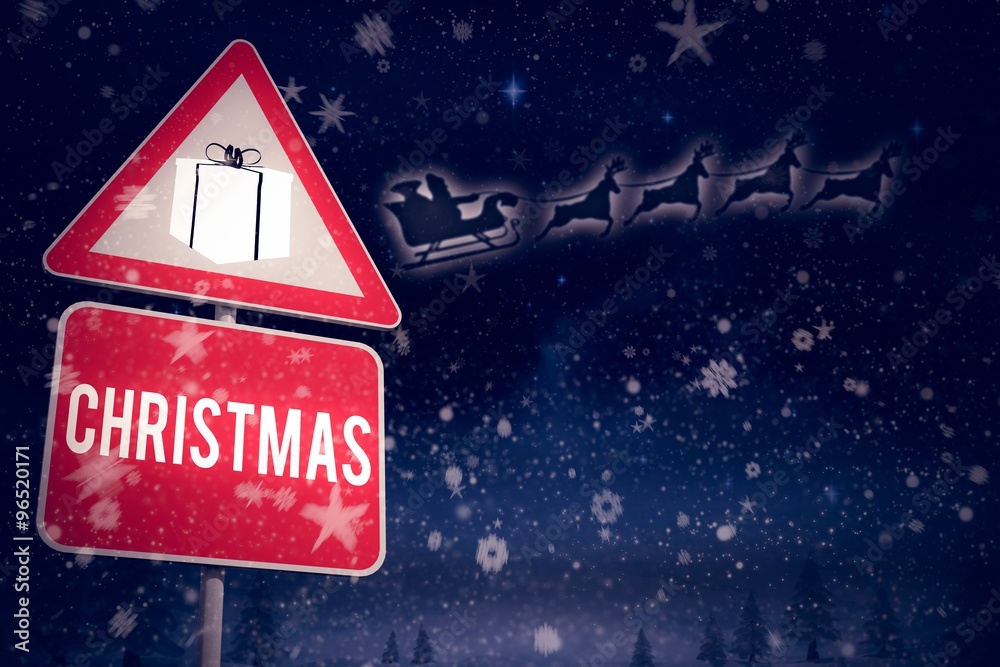 Composite image of christmas road sign