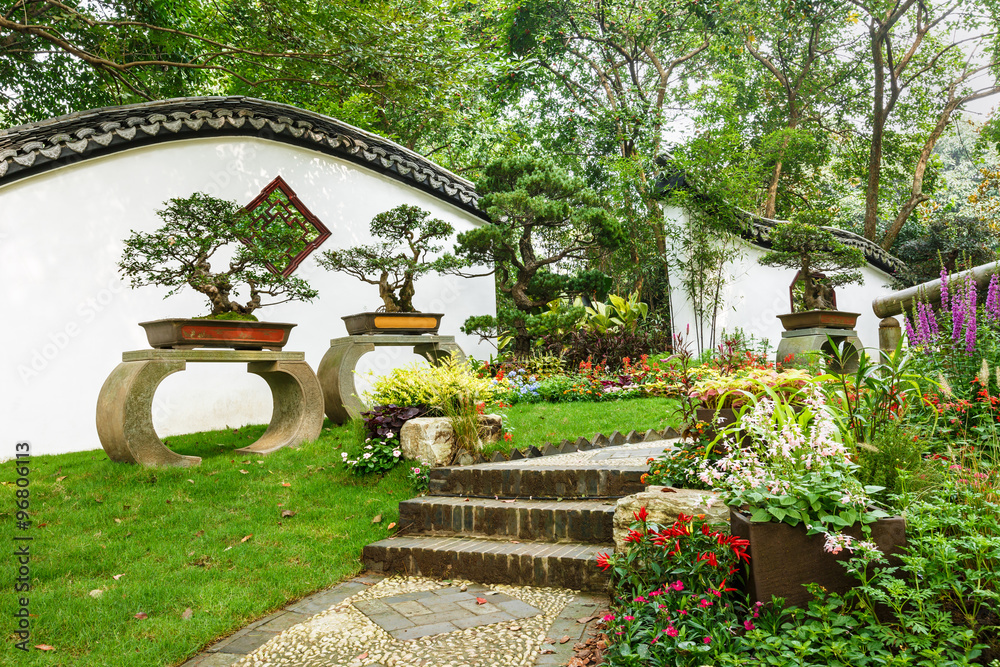 The beauty of the Chinese traditional gardens and green bonsai plants