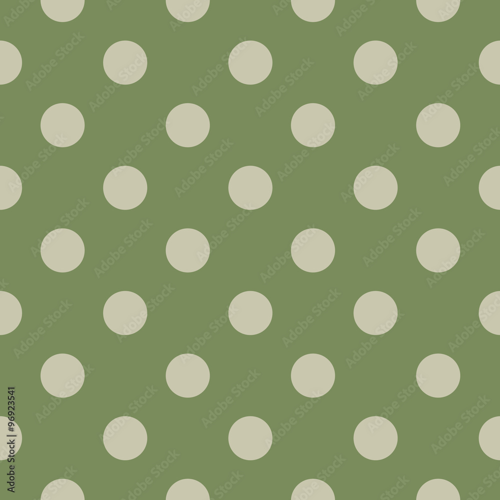 Polka dot seamless pattern on green background