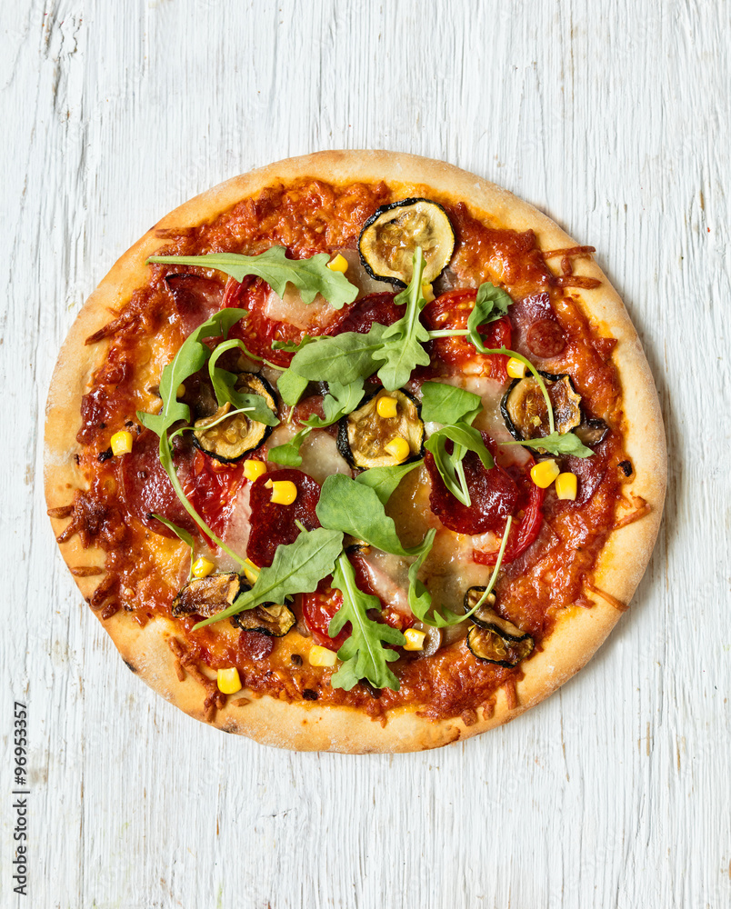 Delicious italian pizza served on wooden table