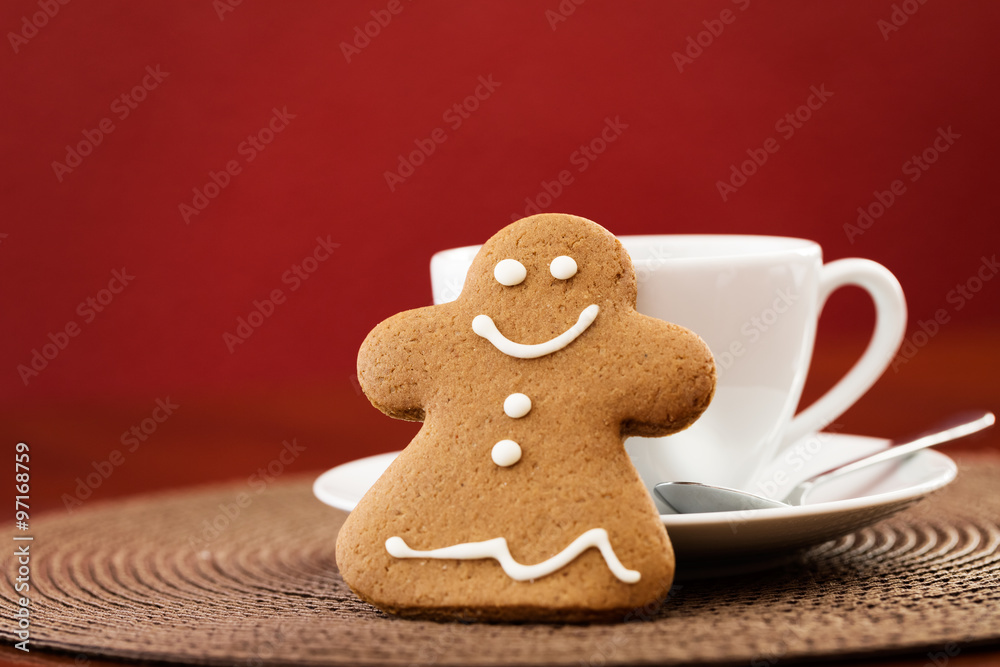 Gingerbread cookie with cup of coffee