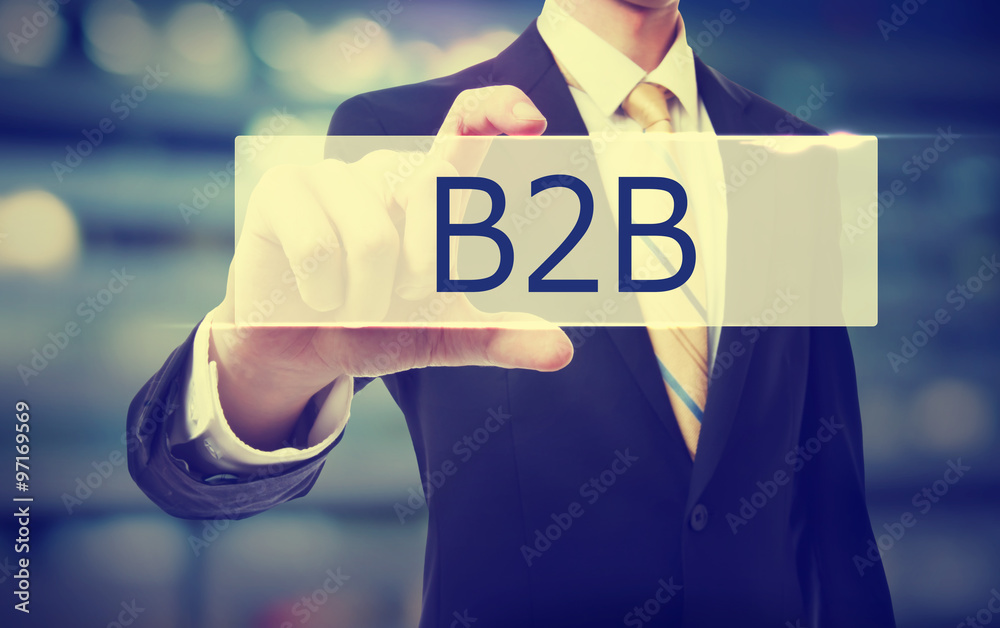 Business man holding B2B concept