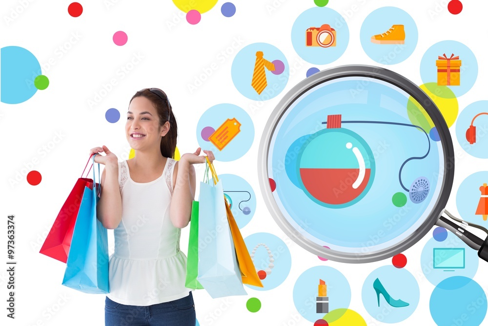 Composite image of happy brunette posing with shopping bags