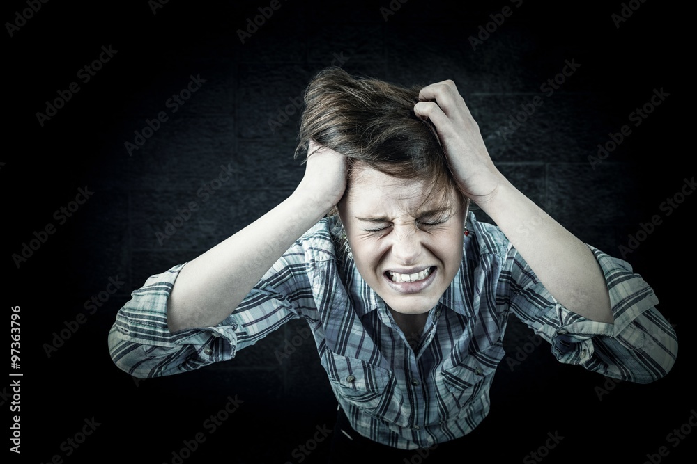 Composite image of pretty brunette shouting with hands on head