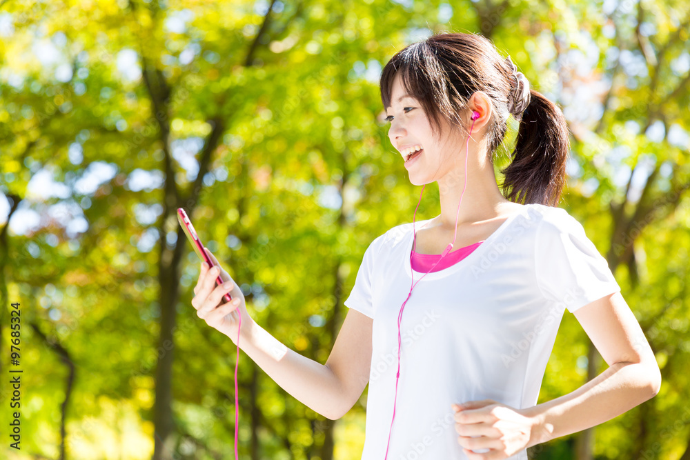 young asian woman jogging image