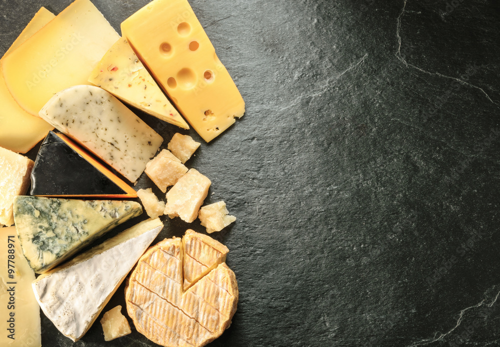 Various types of cheese with empty space background