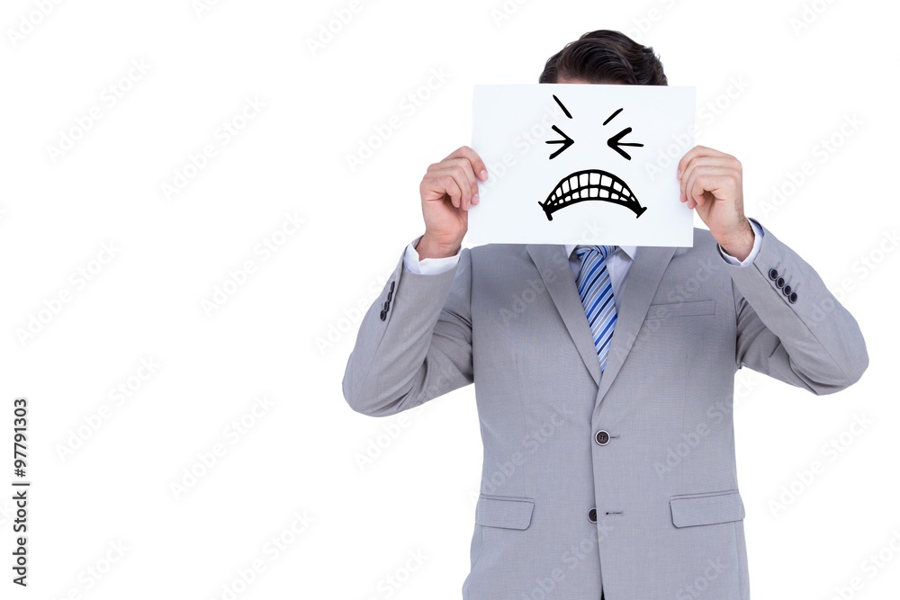 Composite image of businessman holding blank sign