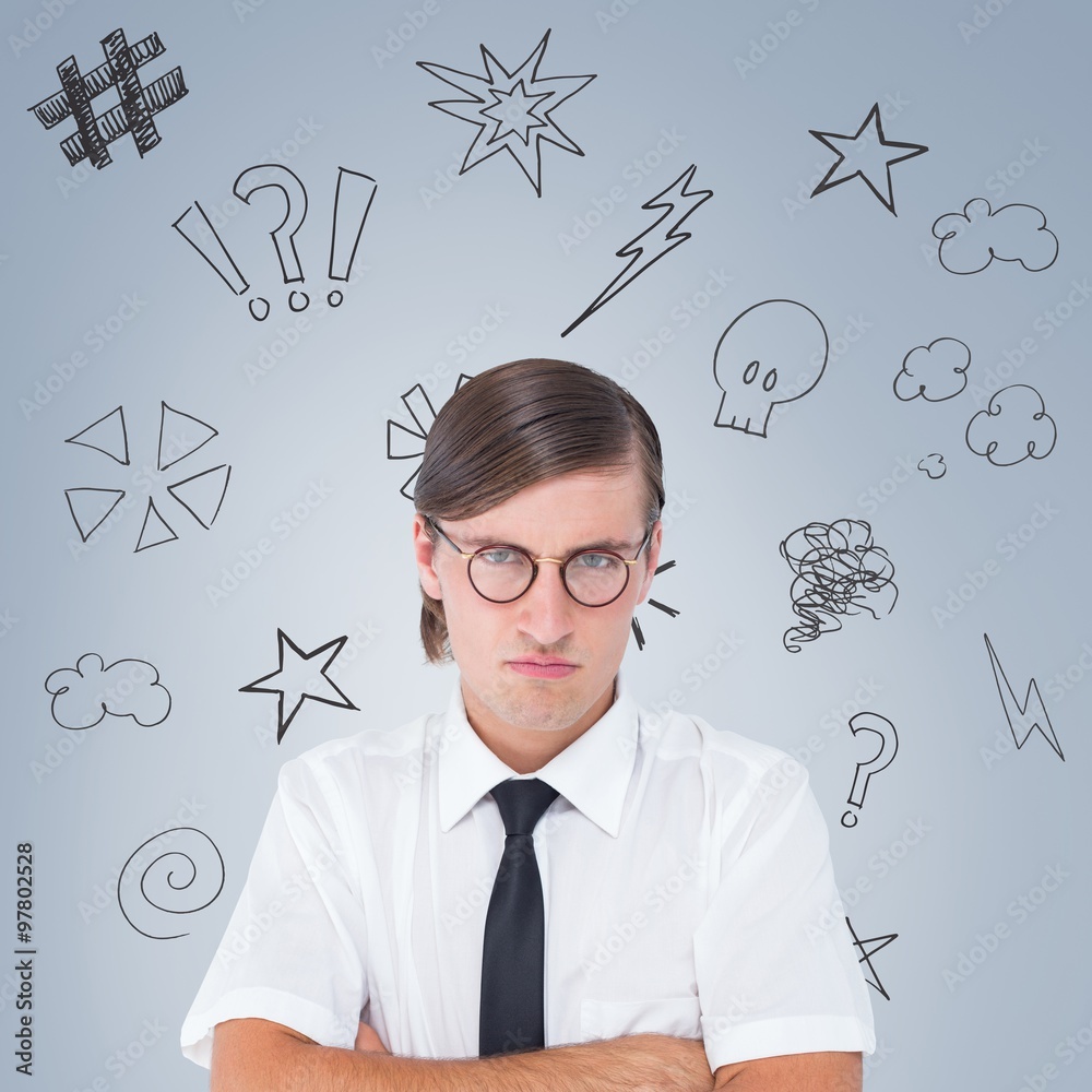 Geeky businessman looking at camera with arms crossed