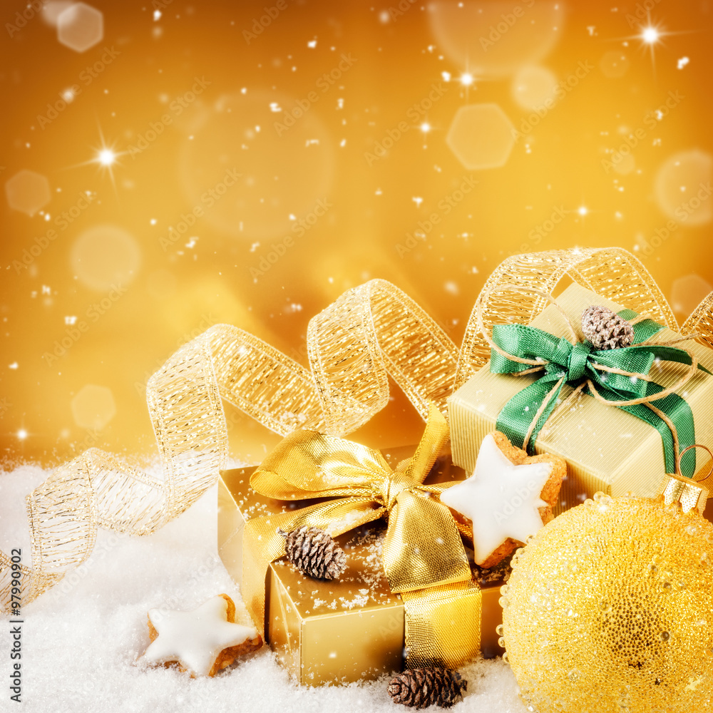 Christmas ornaments and gifts in golden tone