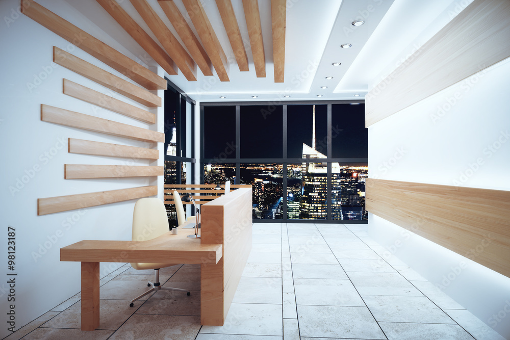 Modern reception area with night city view and windows in floor