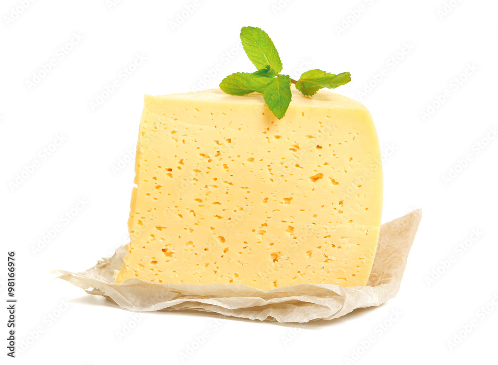 isolated cheese. Russian cheese. Piece of cheese with mint leaves