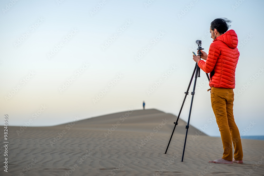 Photographer working outside in the early morning