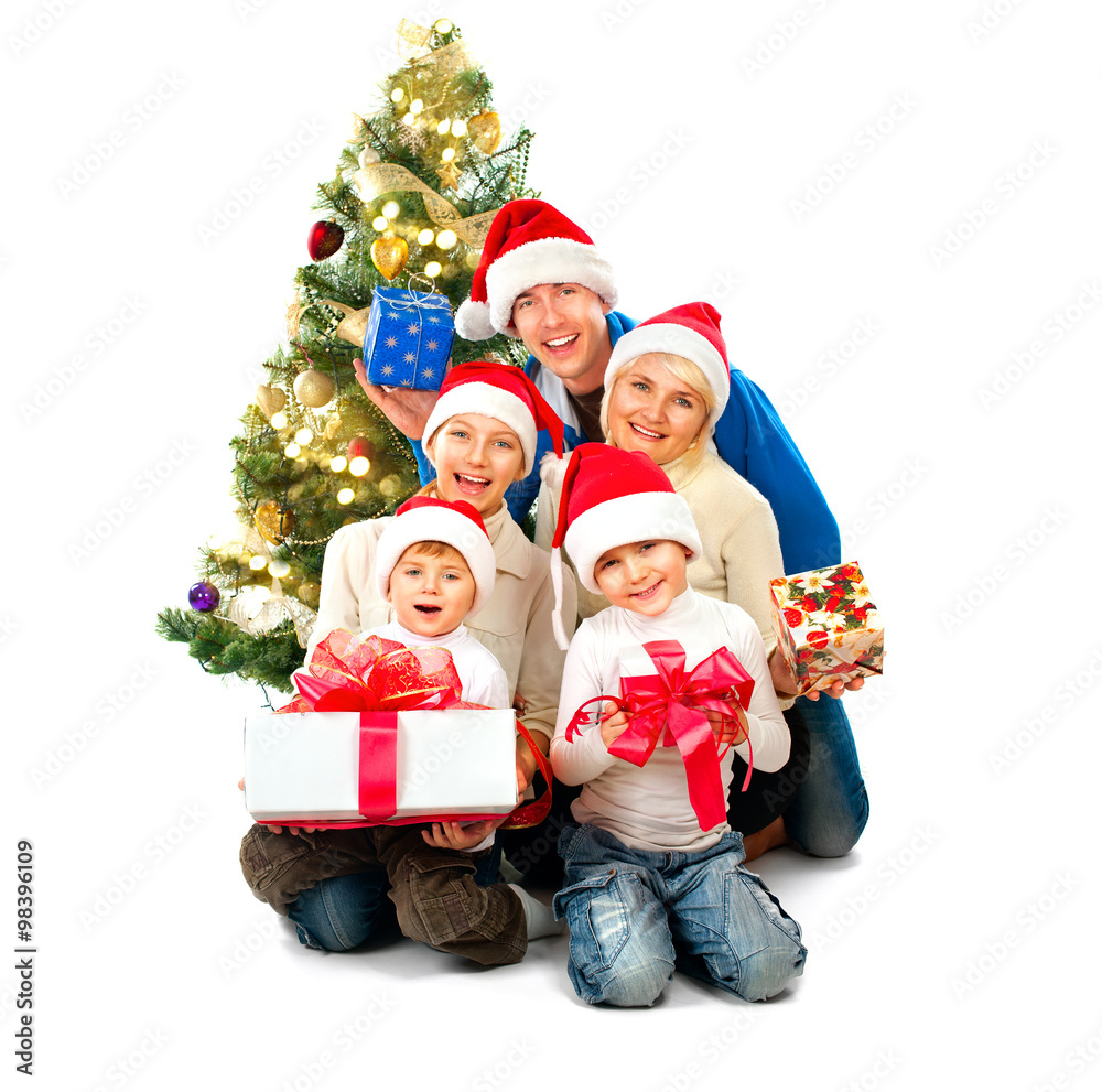 Happy Christmas family with gifts isolated on white