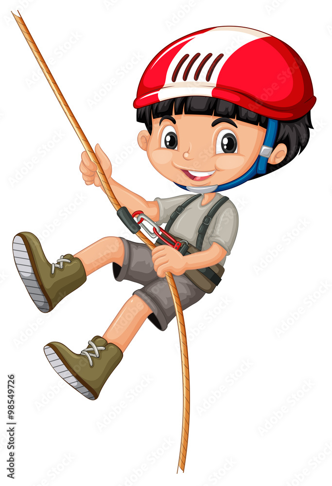 Boy in climbing gears holding a rope