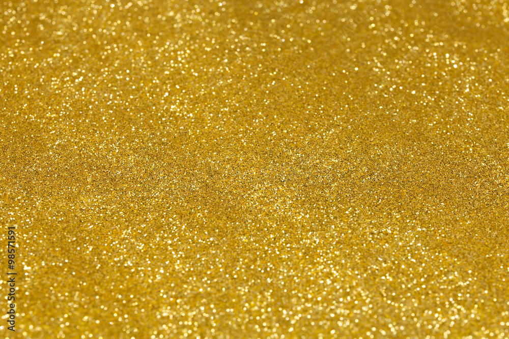 Shining gold glitter detailed texture for background