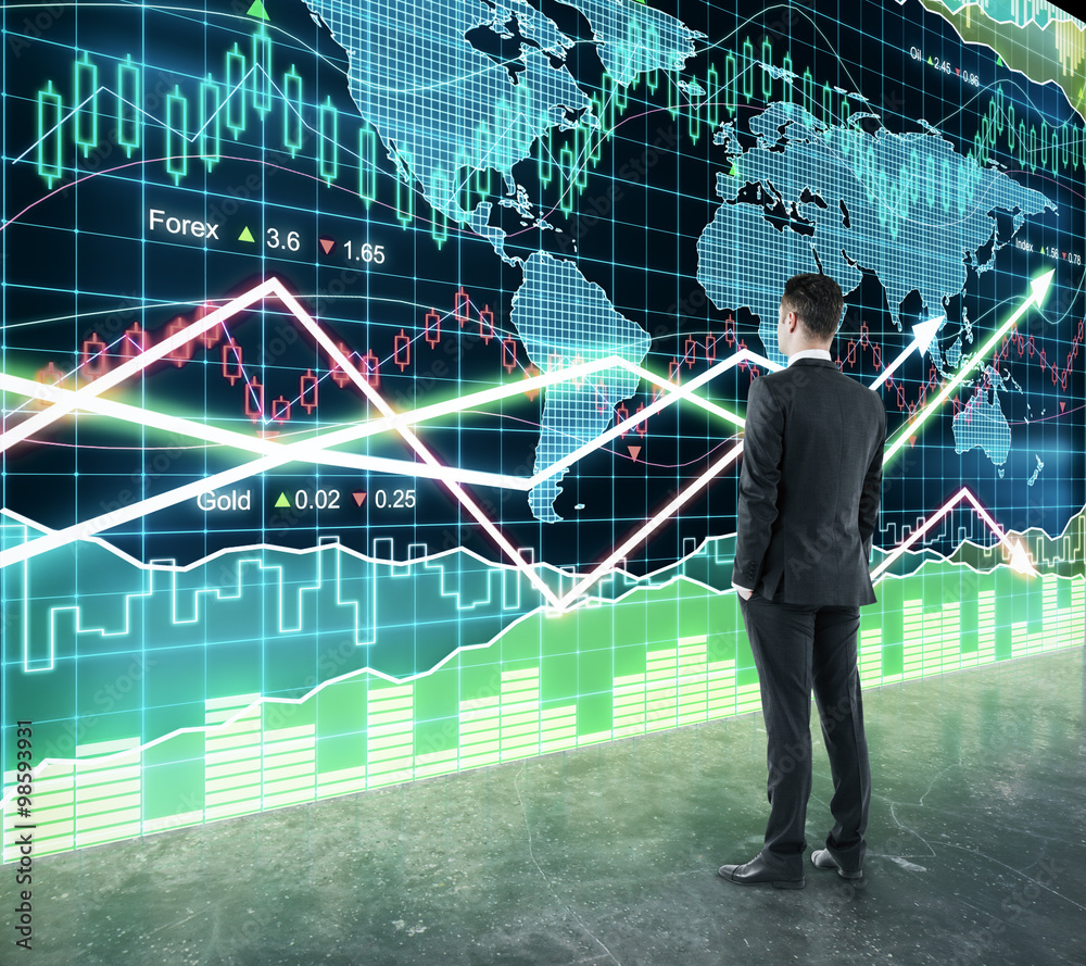 Businessman looking at big screen with business chart and glowin