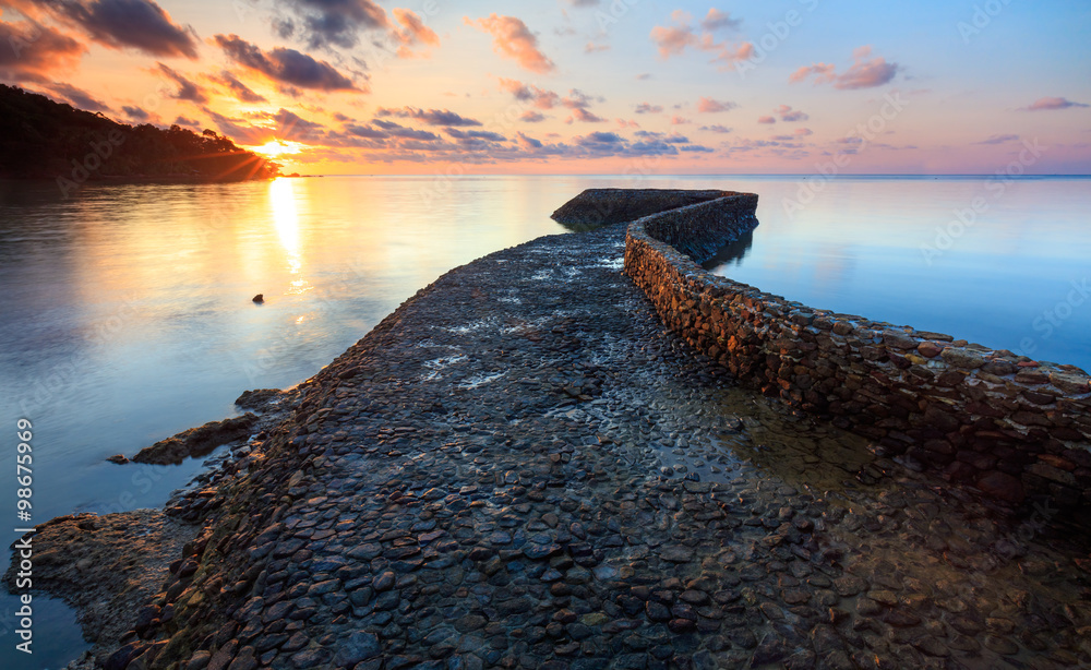 Seascape of path to the sea at sunset