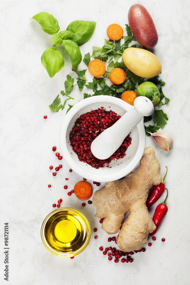 Mortar and pestle with fresh ingredients