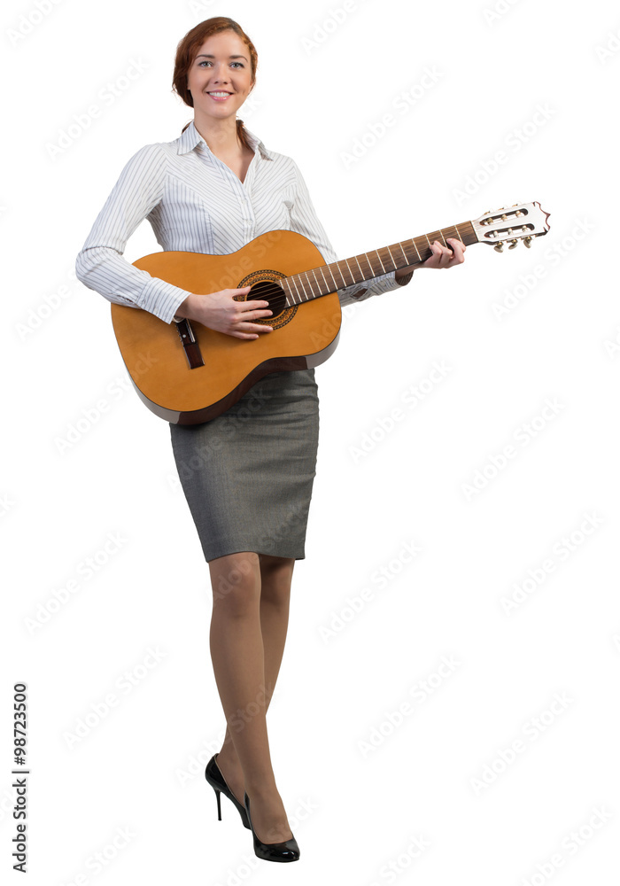 Businesswoman with guitar