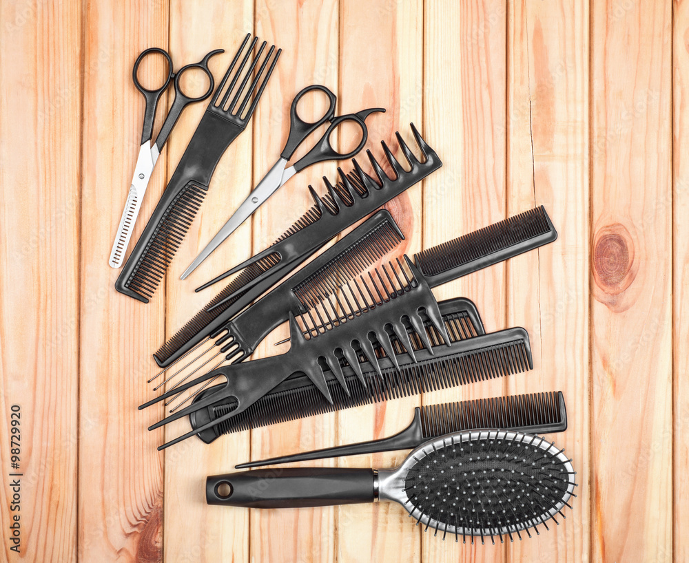 Professional hairdresser tools on table close-up