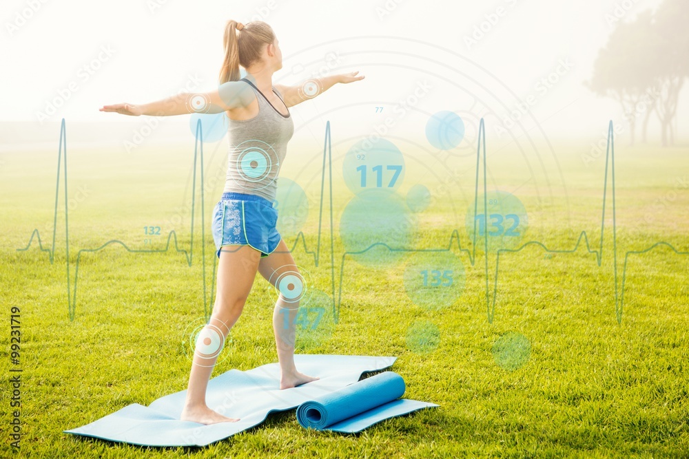 Composite image of sporty blonde doing yoga on exercise mat