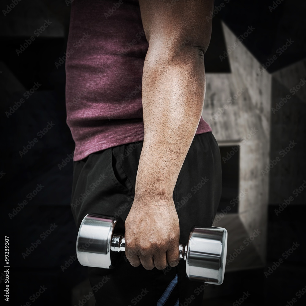 Composite image of fit man exercising with dumbbell 