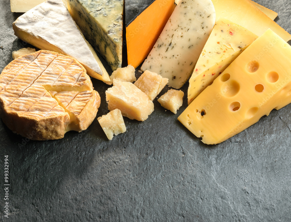 Various types of cheese with empty space background