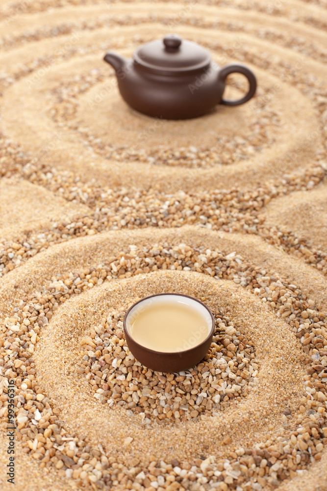 Tea set in sand