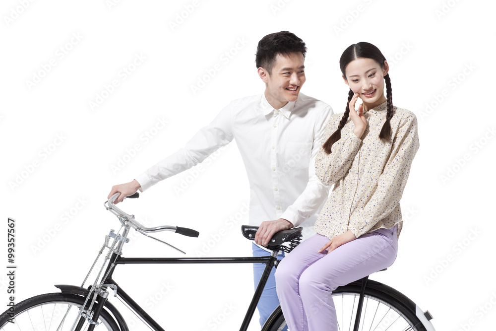 Sweet retro couple with an old-fashioned bicycle