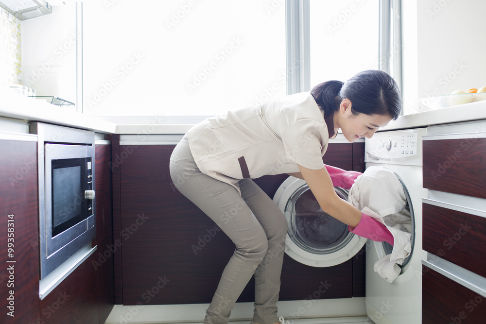 Domestic staff doing laundry