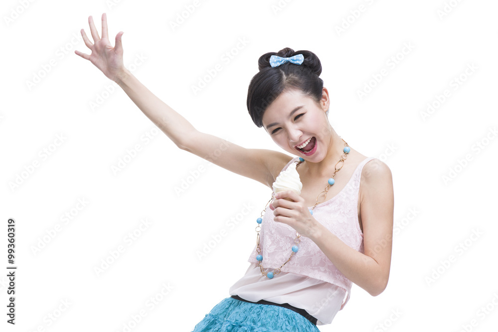 Excited young woman with ice cream cone singing