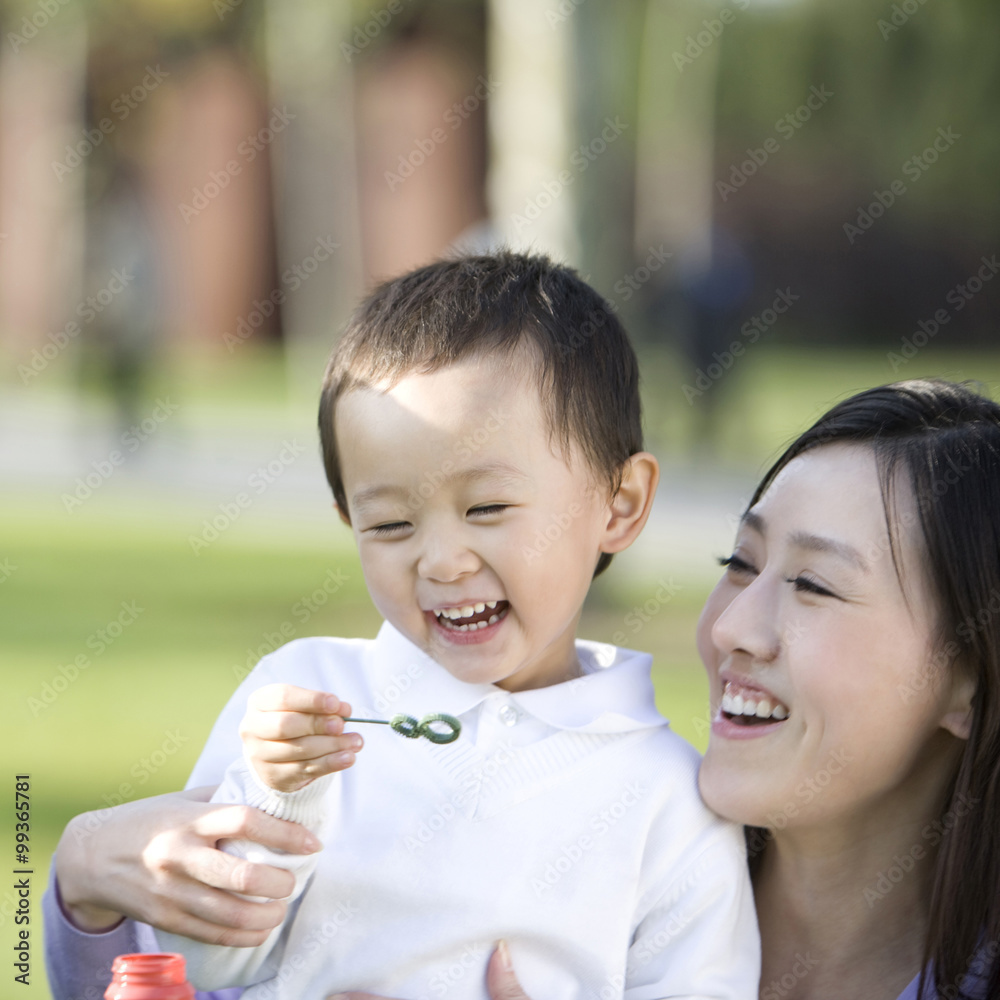 Portrait of young family at the park