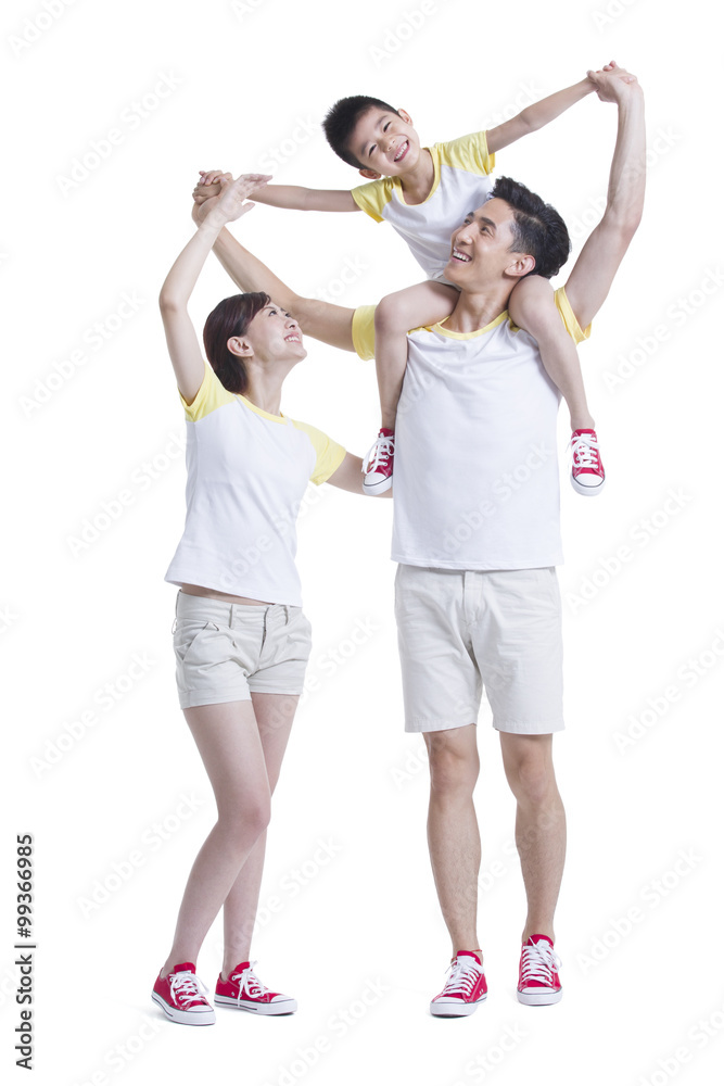 Son sitting on his fathers shoulder