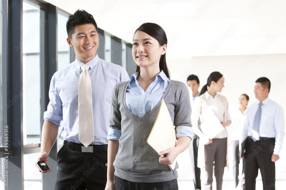 Businesspeople in a hallway