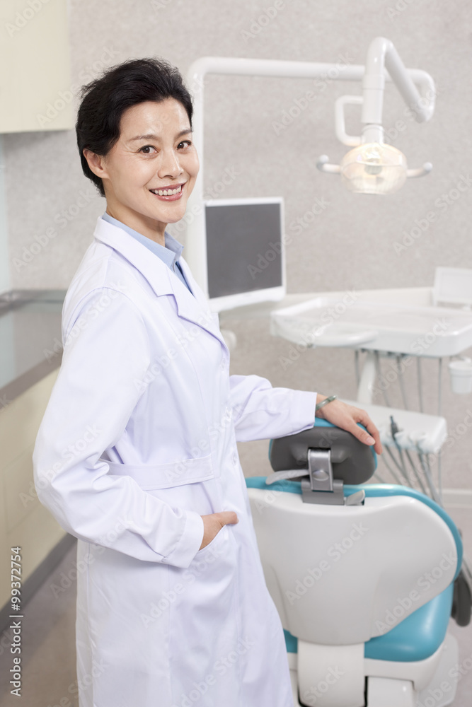 Dentist in dental clinic