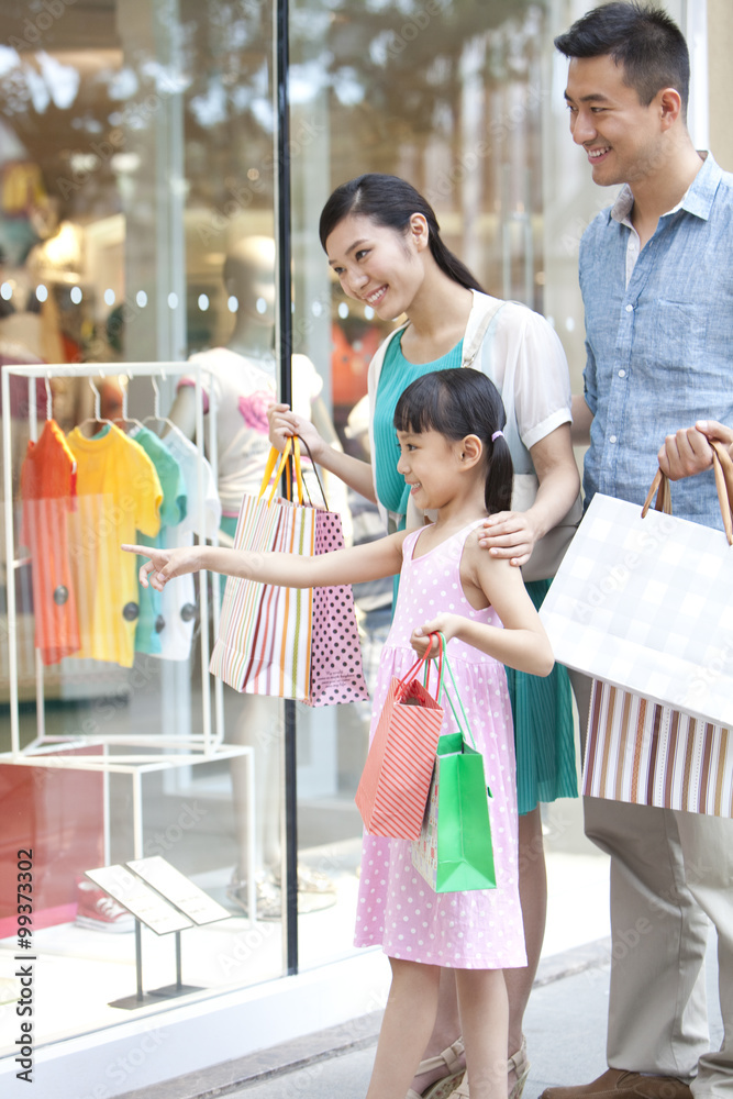 Family shopping in department store