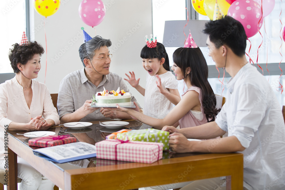 Happy family celebrating birthday